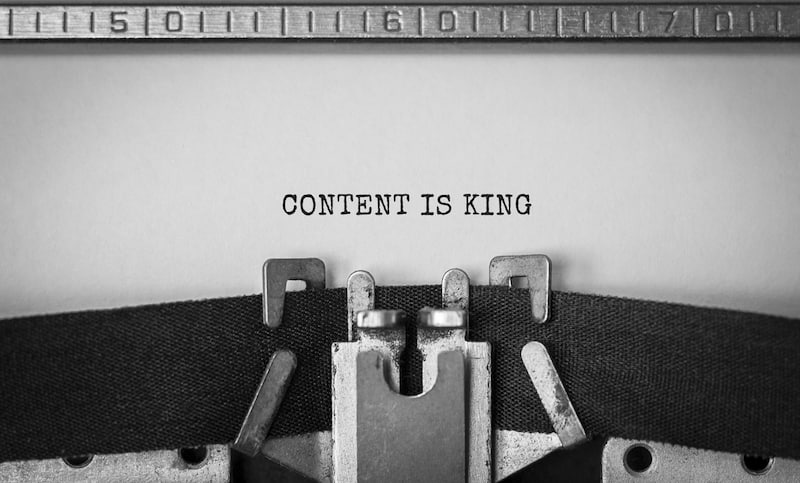 content is king written on old typewriter