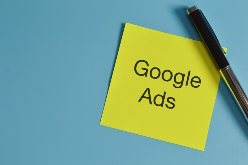 yellow postit note with google ads written on it