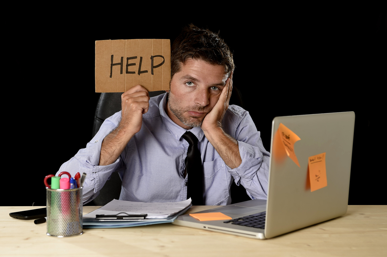 tired desperate businessman in office stress working asking for help